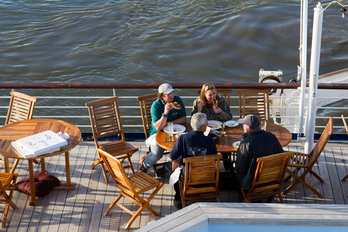 Late pizza lunch after all are on board the Odyssey.