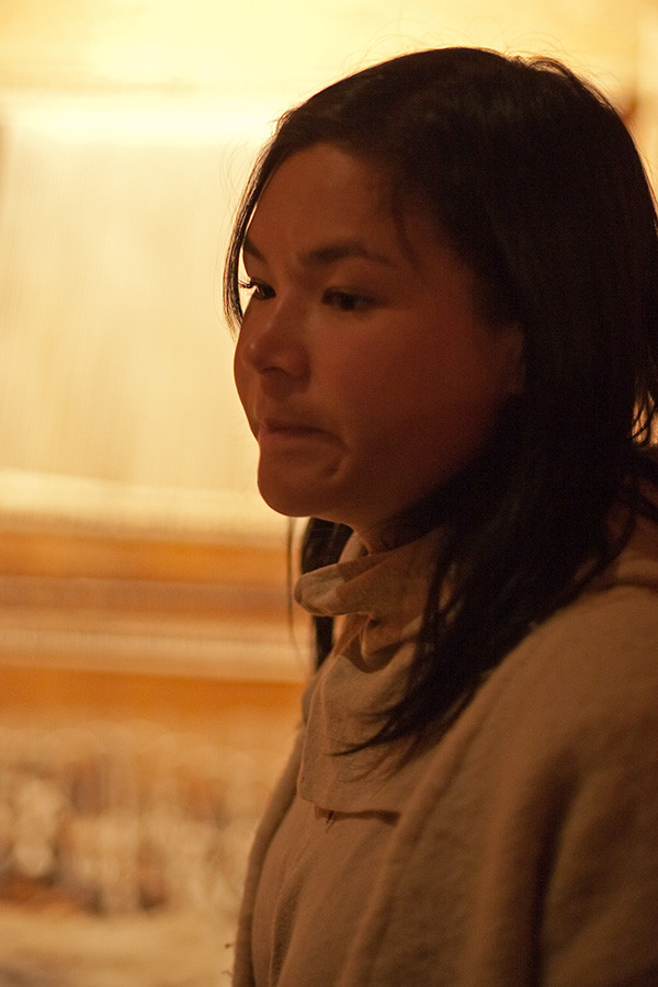 Guide in reconstructed Norse long house, Brattahlid, Greenland