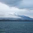 Snaefellsnes Peninsula, West Iceland, shortly after sunrise with Snaefellsjokull (glacier) coming out of the fog. Jules Verne's Journey to the Center of the Earth used Snaefellsjokull as the entry portal for the expedition to the earth's core.