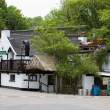 John Meade's Pub. "Flyover" refers to the road on the stone bridge seen above the pub roof.