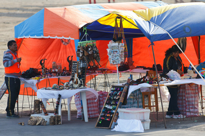 Souvenir stand set up on dock for ship passengers.