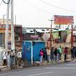 Waiting for the bus, early morning. Quito area.